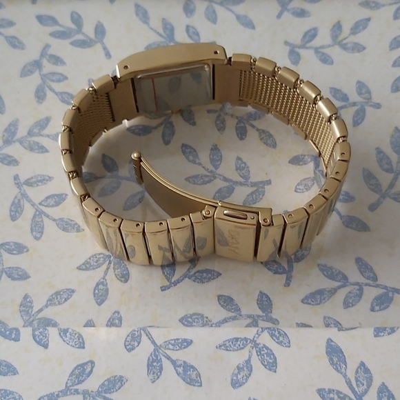 DKNY Crystal and Metal Gold Colored Watch - Picture 3 of 6